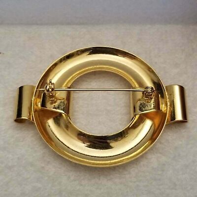 Round Gold Tone Brooch