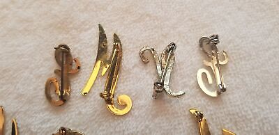 Lot of 7 Letter Brooches