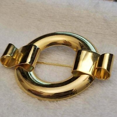 Round Gold Tone Brooch