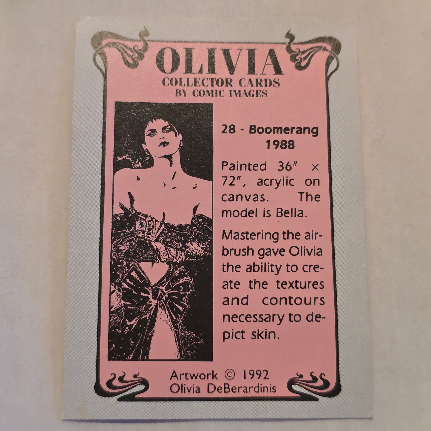 Olivia collector card with black and white illustration on pink background