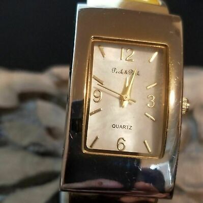 Silver and Yellow Clamper Watch By Peck & Peck
