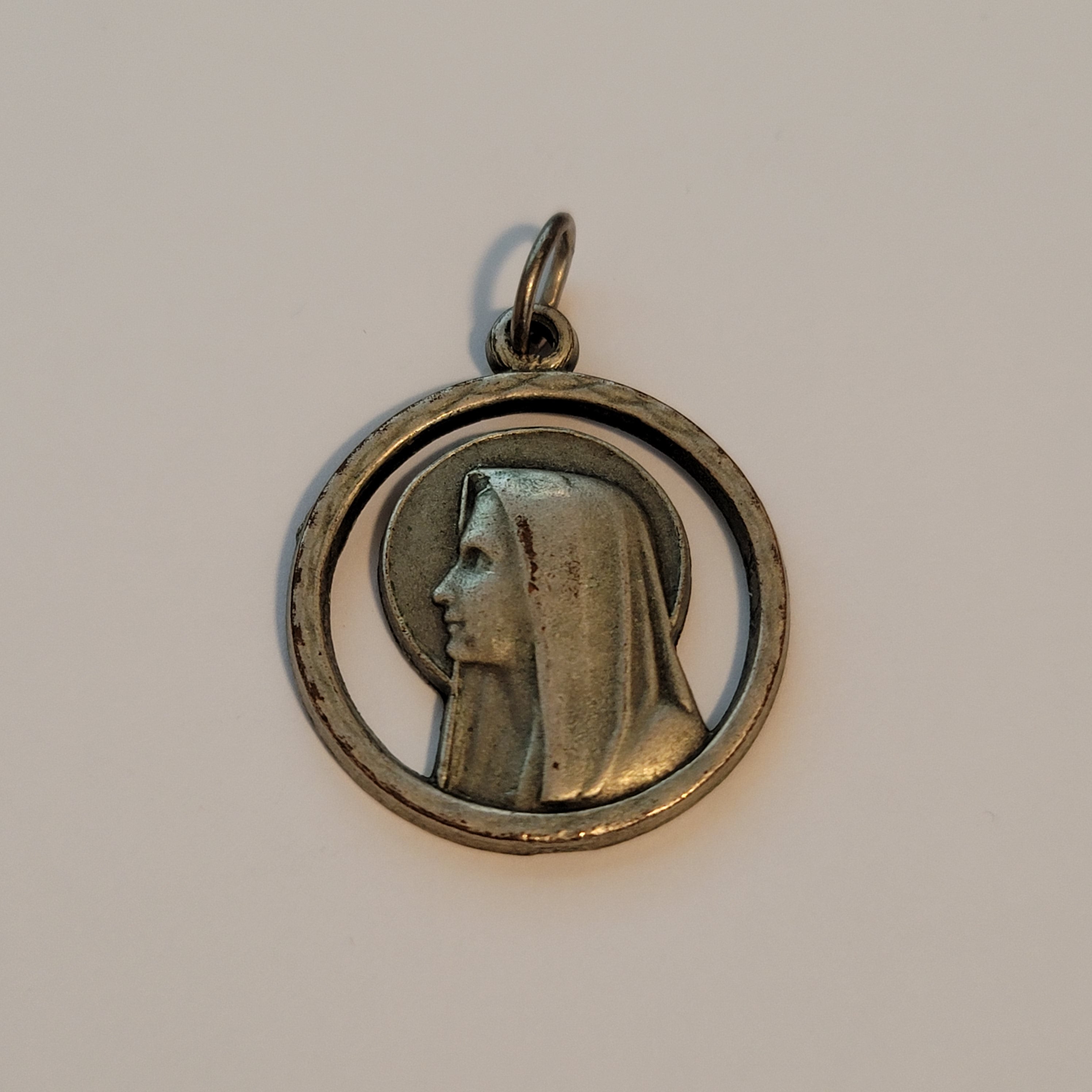 Round Silver Tone Prayer Pendant