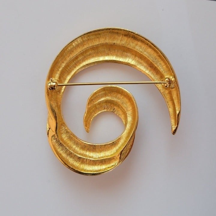 Gold Tone Swirl Brooch