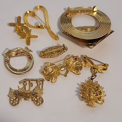 Lot Of 7 Gold Tone Brooches