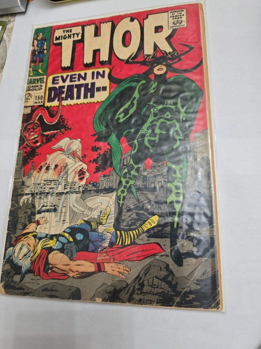 Vintage comic book cover featuring 'The Mighty Thor' with a red and black background.