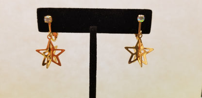 Gold Tone Star Dangle Earrings