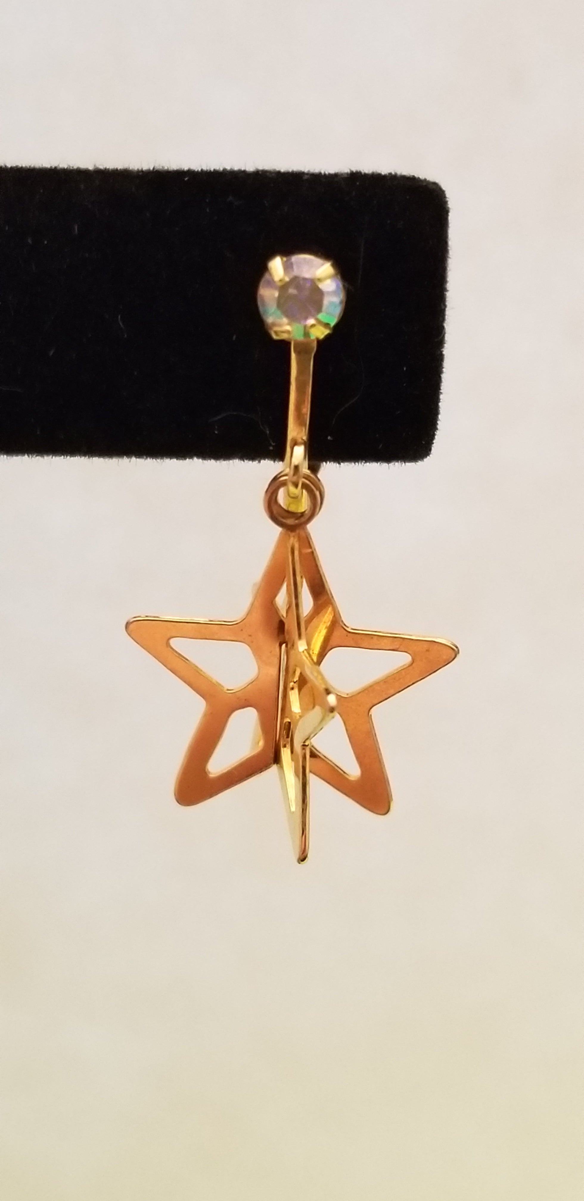 Gold Tone Star Dangle Earrings
