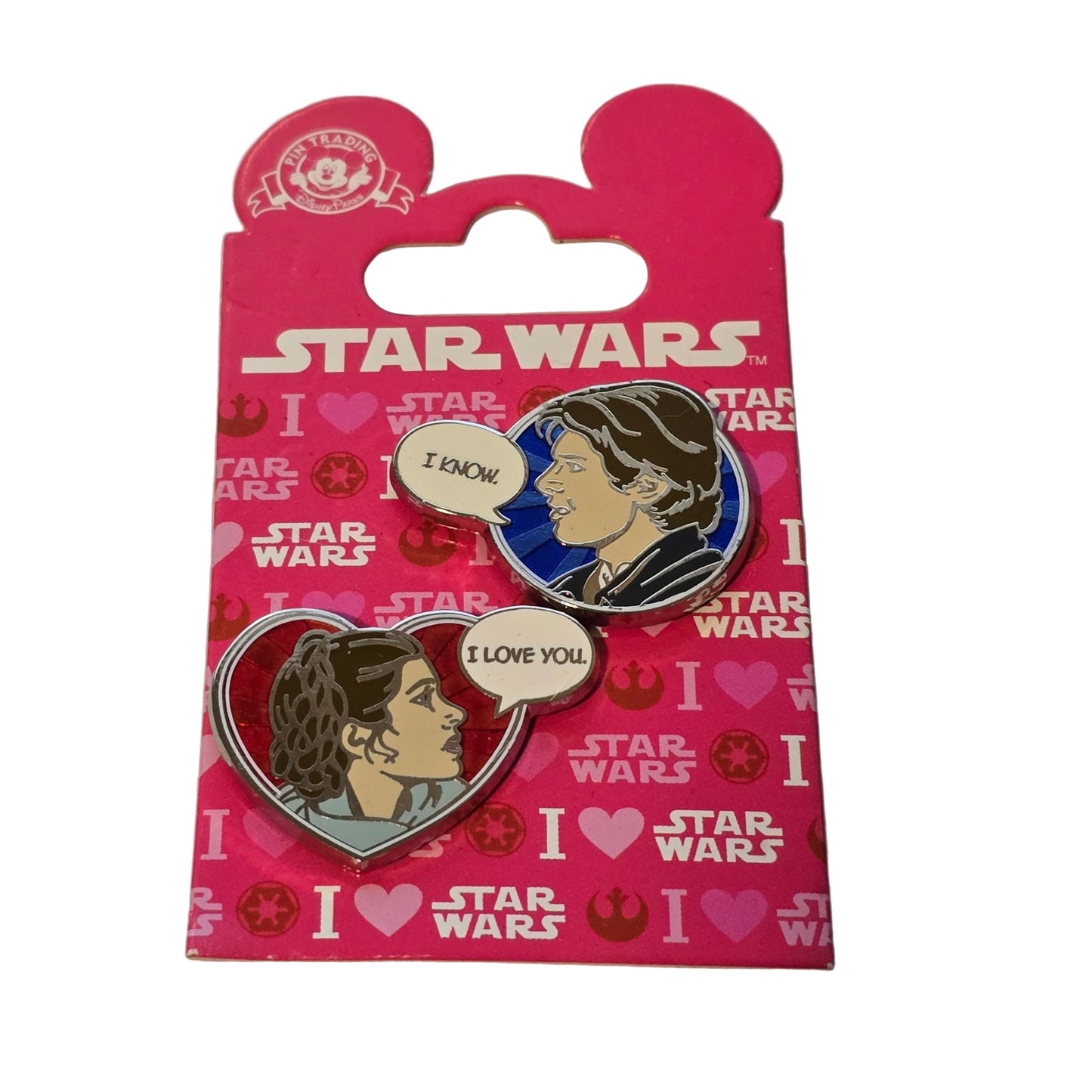 Two 'I Love You' pins on a Star Wars branded card with a pink background.