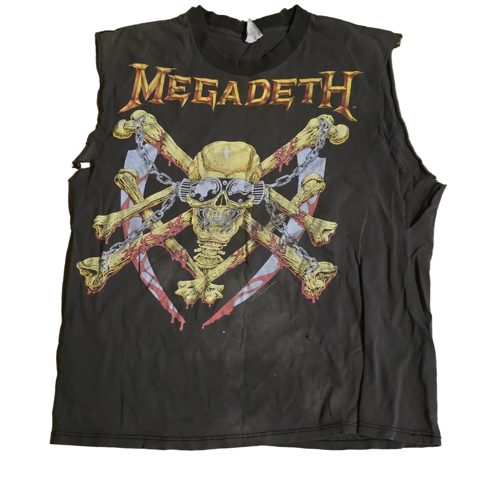 Black t-shirt with Megadeth graphic design on a wooden surface