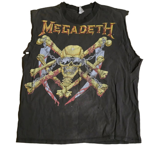 Black t-shirt with Megadeth graphic design on a wooden surface