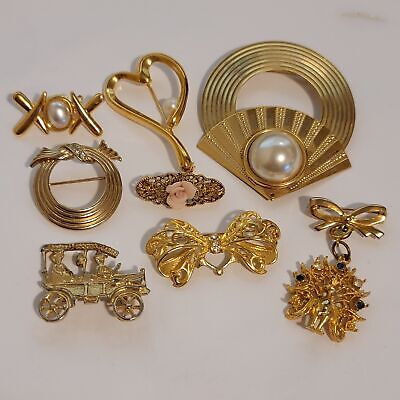 Lot Of 7 Gold Tone Brooches