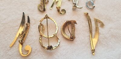 Lot of 7 Letter Brooches