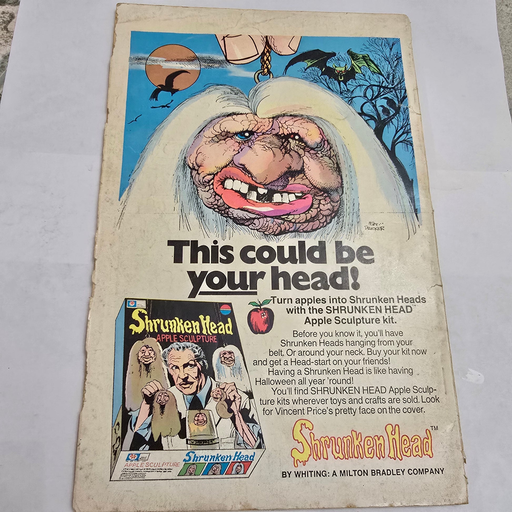 Vintage advertisement for Shrunken Head toy on a white background