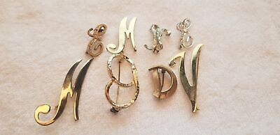 Lot of 7 Letter Brooches