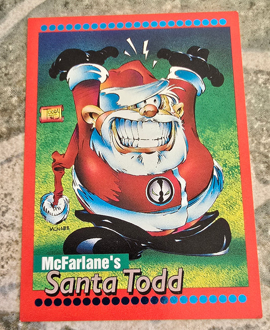 Cartoon character card featuring Santa Todd with a red border on a textured surface.
