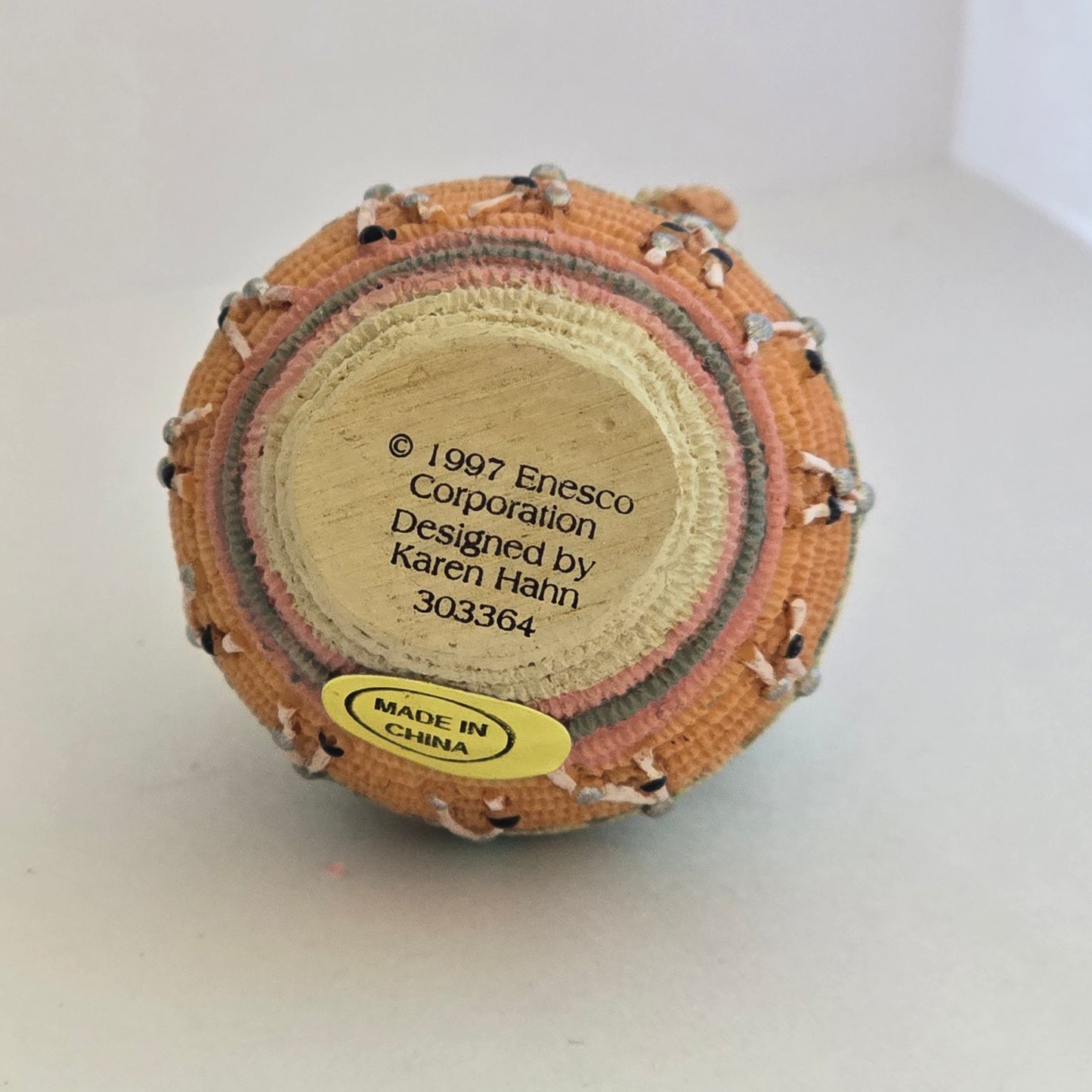 1997 Friends of the Feather – Girl With Flowers on Decorative Pot – Enesco – Karen Hahn