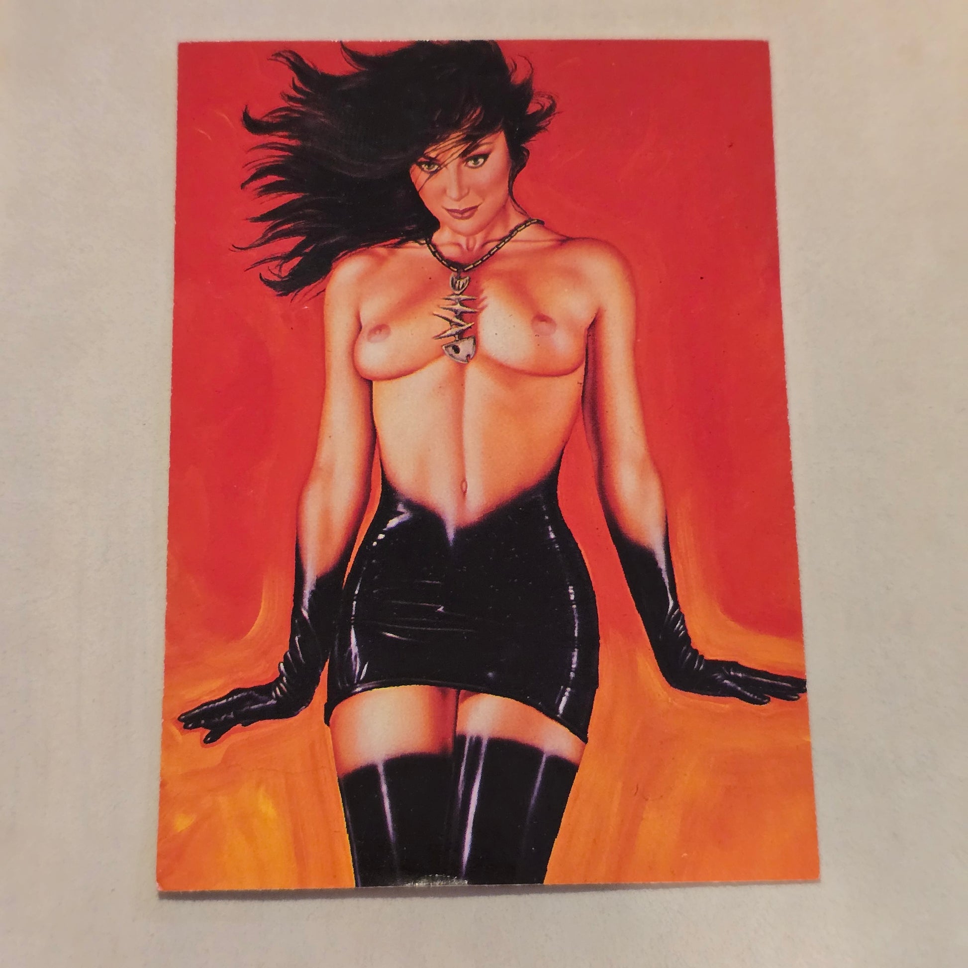 Artistic depiction of a person in black latex outfit on a red background