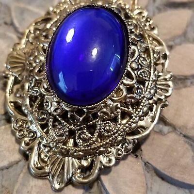Gold Tone Blue Cabochon Filigree Brooch