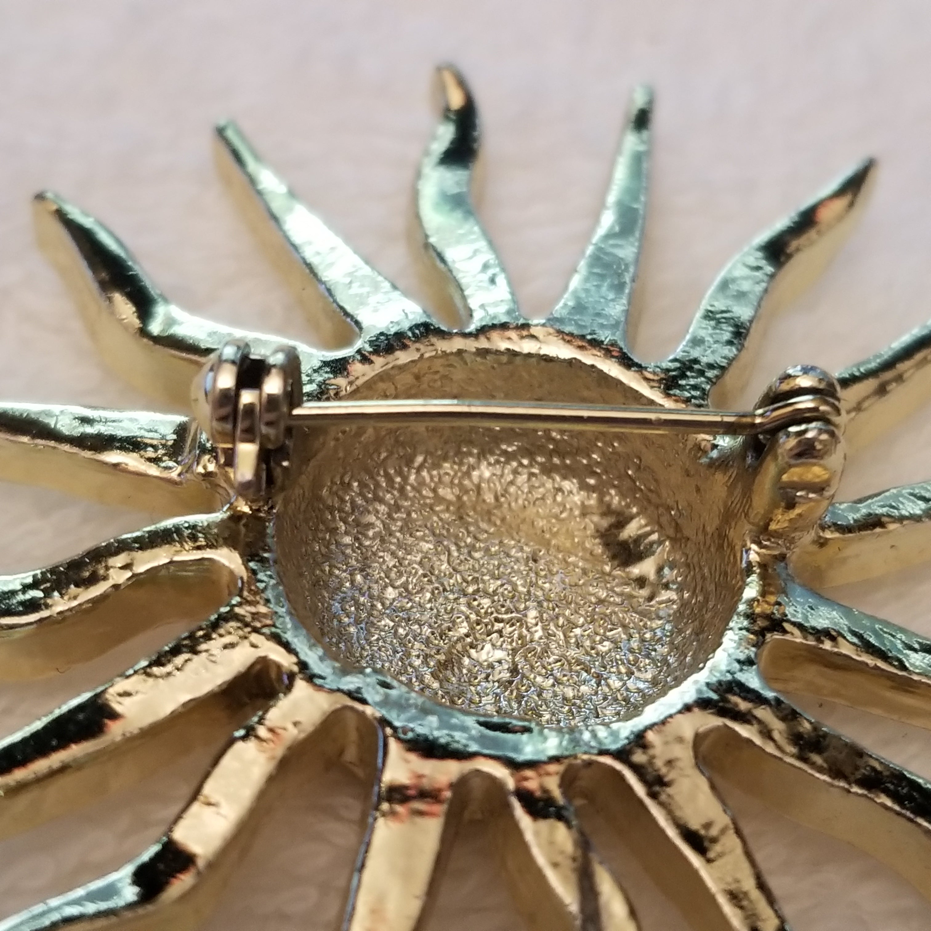 Gold Tone Sun Brooch