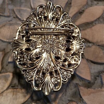 Gold Tone Blue Cabochon Filigree Brooch