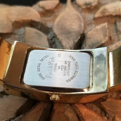 Silver and Yellow Clamper Watch By Peck & Peck