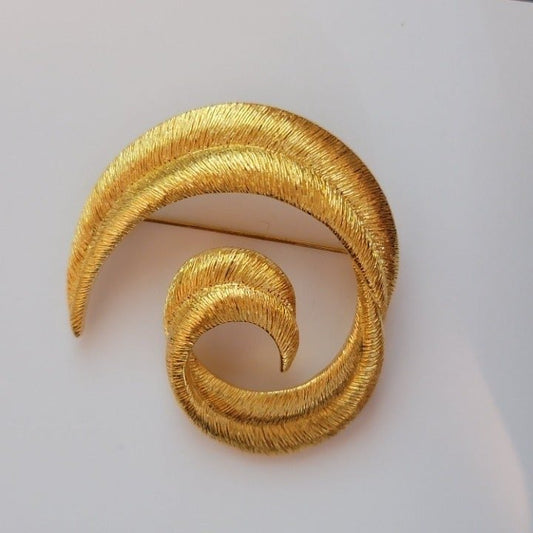 Gold Tone Swirl Brooch