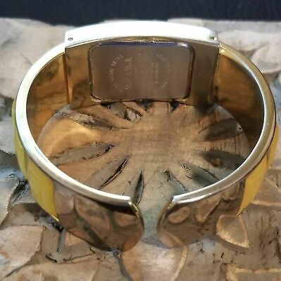 Silver and Yellow Clamper Watch By Peck & Peck