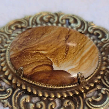 Gold Tone Gasper Cabochon Brooch